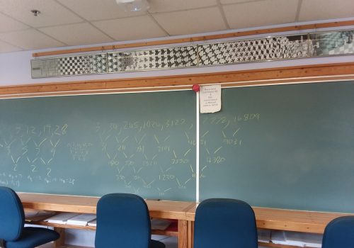 Picture of the board with some mathematics in the Math Lab